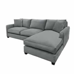 custom built rogan sectional with feather wrapped seats and chaise on right